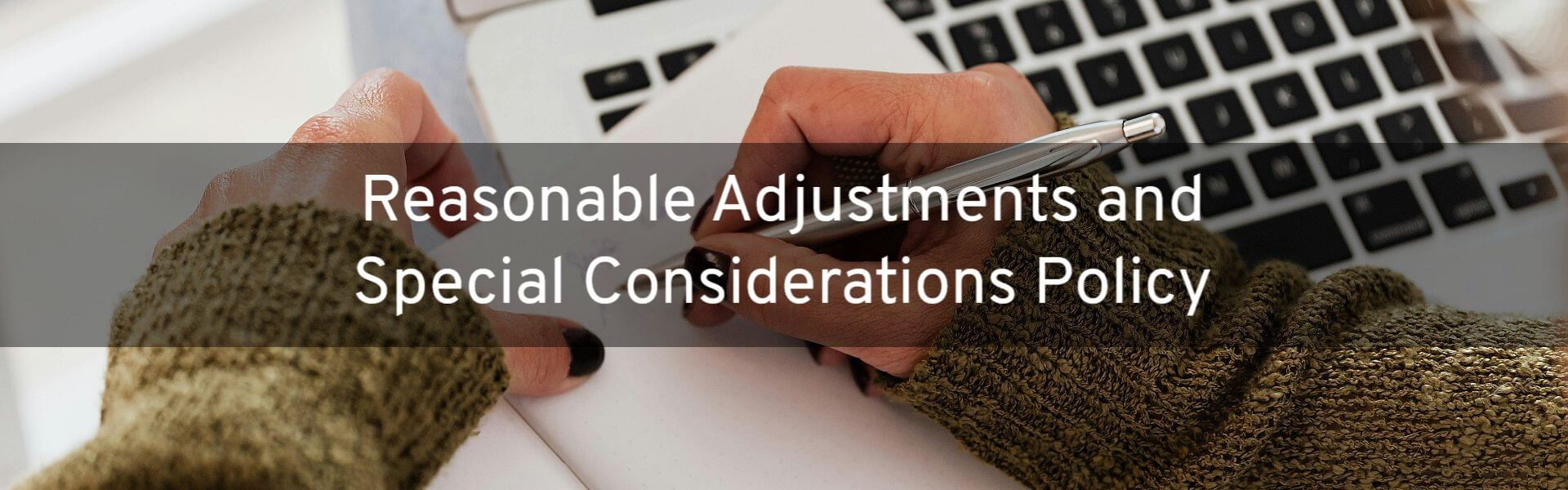 Reasonable Adjustments and Special Considerations Policy. A person writing notes next to a laptop.